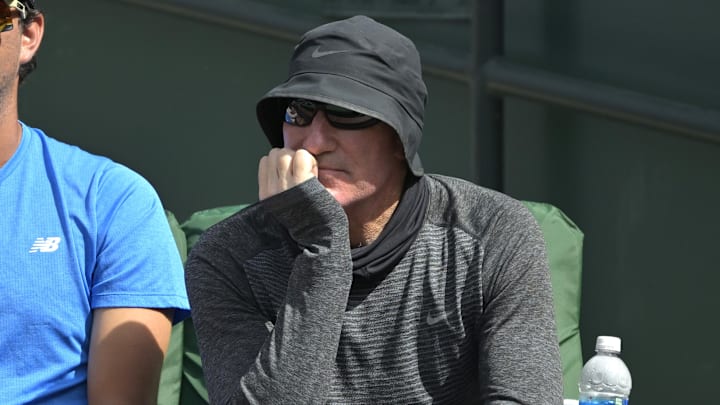 Mar 13, 2024; Indian Wells, CA, USA; Brad Gilbert, coach of Coco Gauff (USA), watches the fourth round match against Elise Mertens (BEL) in the BNP Paribas Open at the Indian Wells Tennis Garden. Mandatory Credit: Jayne Kamin-Oncea-Imagn Images