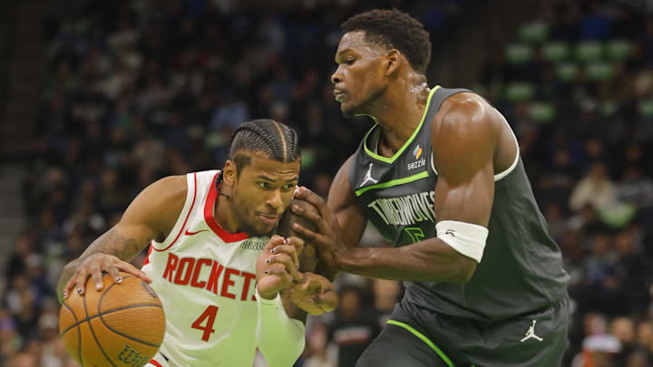 Houston Rockets guard Jalen Green drives against Minnesota Timberwolves guard Anthony Edwards in the first quarter at Target Center in Minneapolis on Nov. 26, 2024.