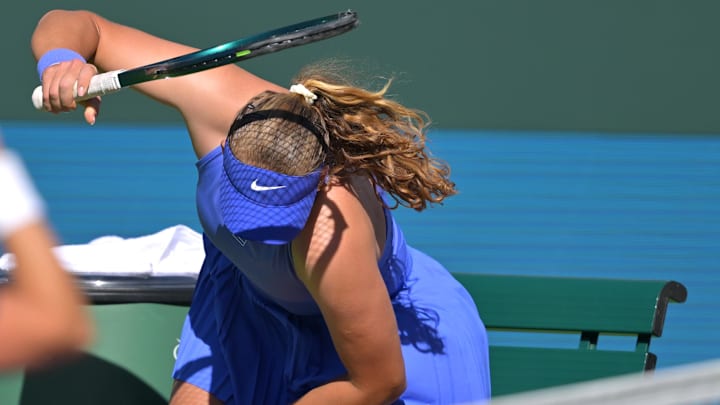 Mirra Andreeva smashed her racket after losing the second set tiebreaker against Katerina Siniakova in the BNP Paribas Open at the Indian Wells Tennis Garden. 