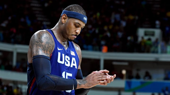 Aug 10, 2016; Rio de Janeiro, Brazil; USA forward Carmelo Anthony (15) reacts against Australia during men's basketball preliminary round in the Rio 2016 Summer Olympic Games at Carioca Arena 1. 