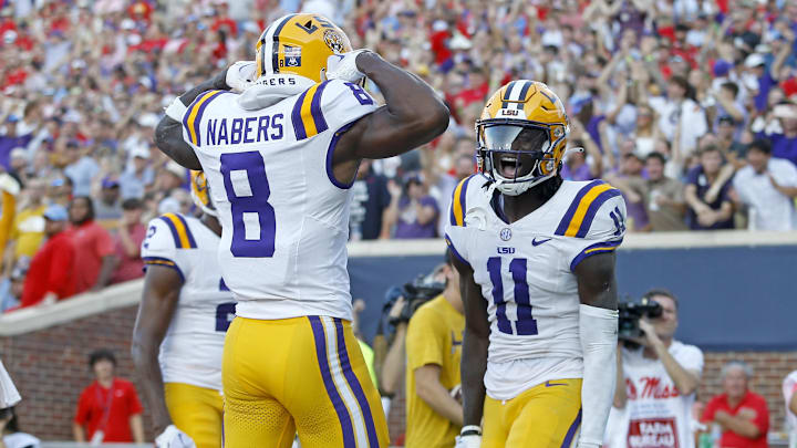 Sep 30, 2023; Oxford, Mississippi, USA; LSU Tigers wide receiver Brian Thomas Jr. (11) reacts with