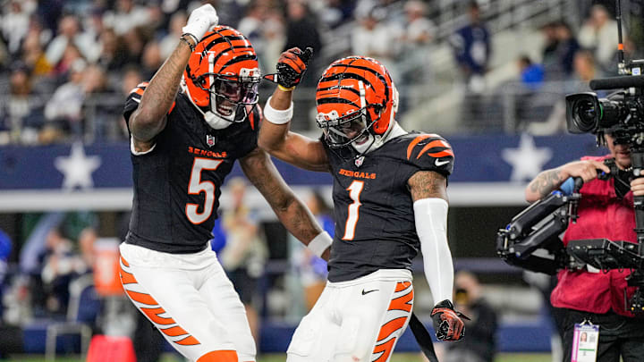 Cincinnati Bengals wide receiver Tee Higgins (5) and wide receiver Ja'Marr Chase (1) dance after Chase scored a touchdown in the 4th quarter to beat the Dallas Cowboys in Monday Night Football at AT&T Stadium in Arlington, Texas on Monday, December 9, 2024.