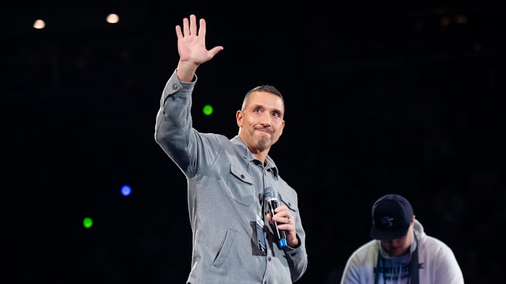Penn State Nittany Lions football coach Matt Campbell waves to the crowd during a Big Ten wrestling match against Nebraska.