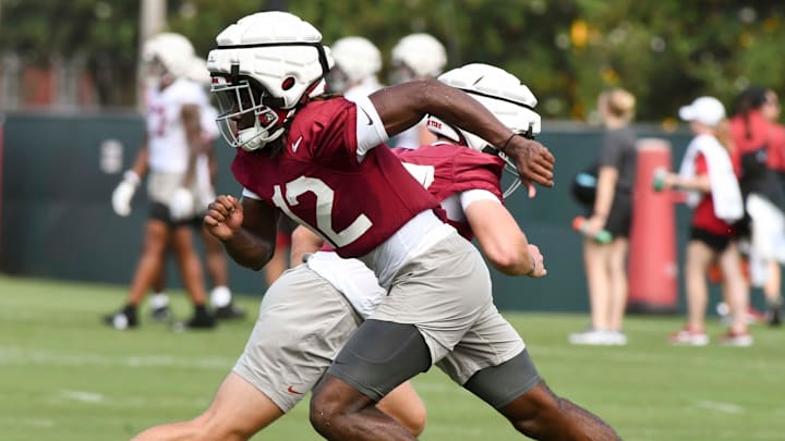 The Crimson Tide football team continued practice Thursday, Aug. 1, 2024, as they prepare for the season opener and the first game under new head coach Kalen DeBoer. Alabama defensive back Zavier Mincey (12) takes off on the whistle for a defensive drill.