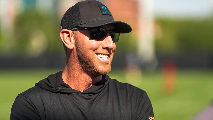 Jacksonville Jaguars head coach Liam Coen laughs with coaches before the Jaguars held their final Organized Team Activity on Monday, June 15, 2026 at the Miller Electric Center in Jacksonville, Fla.