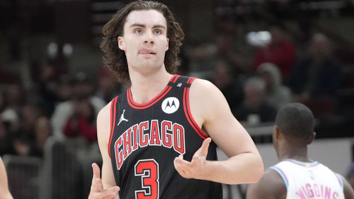 Apr 9, 2025; Chicago, Illinois, USA; Chicago Bulls guard Josh Giddey (3) reacts after making a three point basket against the Miami Heat during the second half at United Center. Mandatory Credit: David Banks-Imagn Images