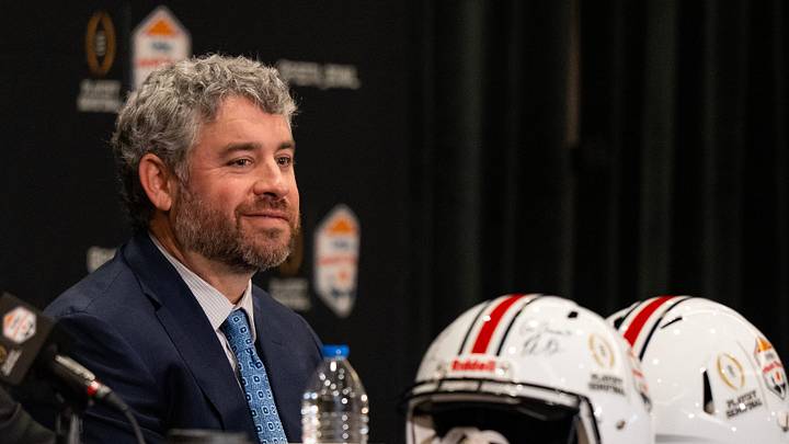 Ole Miss Head Coach Pete Golding smiles while Miami Head Coach Mario Cristobal answers a question during a CFP and Fiesta Bowl press conference at the JW Marriott Scottsdale Camelback Inn Resort & Spa, in Scottsdale, Ariz., on Wednesday, Jan. 7, 2026.