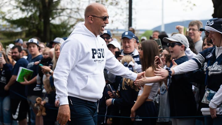 Penn State football head coach James Franklin greets fans on Curtin Road outside Beaver Stadium before the Blue-White Game.