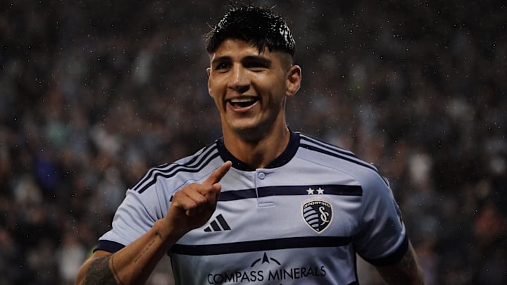 Alan Pulido celebrates scoring for KC