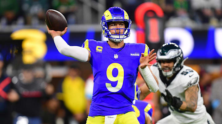 Nov 24, 2024; Inglewood, California, USA; Los Angeles Rams quarterback Matthew Stafford (9) throws against the Philadelphia Eagles during the first half at SoFi Stadium. Mandatory Credit: Gary A. Vasquez-Imagn Images
