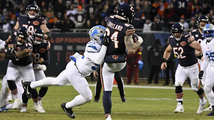 Jan 4, 2026; Chicago, Illinois, USA; Chicago Bears tight end Colston Loveland (84) makes a catch against Detroit Lions linebacker Derrick Barnes (55) before fumbling the ball for a turnover during the first half at Soldier Field. Mandatory Credit: Matt Marton-Imagn Images