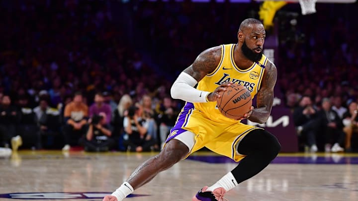 Apr 30, 2025; Los Angeles, California, USA; Los Angeles Lakers forward LeBron James (23) controls the ball against the Minnesota Timberwolves during the first half in game five of first round for the 2025 NBA Playoffs at Crypto.com Arena. Mandatory Credit: Gary A. Vasquez-Imagn Images