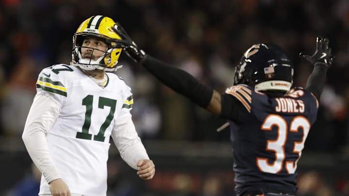 Jan 10, 2026; Chicago, IL, USA; Green Bay Packers place kicker Brandon McManus (17) reacts to missing a field goal late in the fourth quarter as Chicago Bears cornerback Jaylon Jones (33) celebrates in an NFC Wild Card Round game at Soldier Field. Mandatory Credit: Dan Powers/USA TODAY Network via Imagn Images