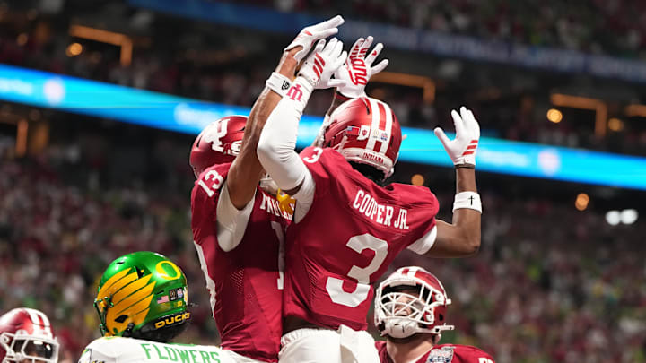 Jan 9, 2026; Atlanta, GA, USA; Indiana Hoosiers wide receiver Omar Cooper Jr. (3) celebrates his touchdown catch with wide receiver Elijah Sarratt (13) during the first half of the 2025 Peach Bowl and semifinal game of the College Football Playoff against the Oregon Ducks at Mercedes-Benz Stadium. Mandatory Credit: Dale Zanine-Imagn Images