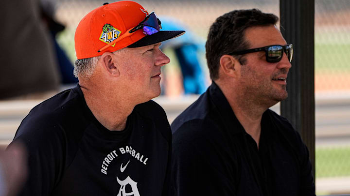 Detroit Tigers manager A.J. Hinch, left, talks to vice president and assistant general manager Ryan Garko as they watch practice during spring training at TigerTown in Lakeland, Fla. on Thursday, Feb. 12, 2026.