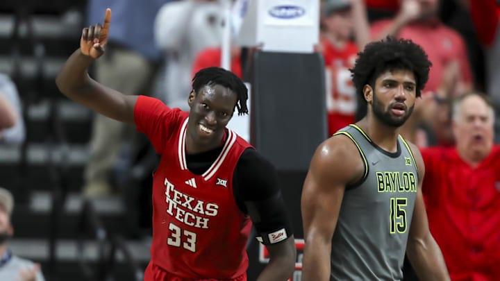 Feb 4, 2025; Lubbock, Texas, USA;  Texas Tech Red Raiders forward Federiko Federiko (33) reacts in the second half during the game against Baylor Bears forward Norchad Omier (15) in the second half at United Supermarkets Arena. Mandatory Credit: Michael C. Johnson-Imagn Images