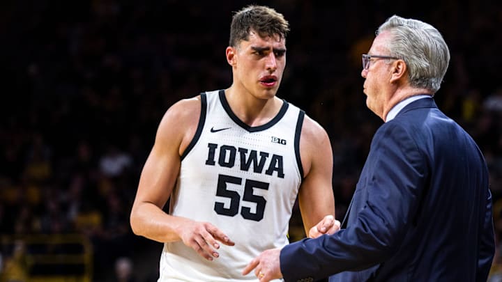 Iowa center Luka Garza (55) talks with Iowa head coach Fran McCaffery during a NCAA Big Ten Conference men's basketball game against Purdue, Tuesday, March 3, 2020, at Carver-Hawkeye Arena in Iowa City, Iowa.

200303 Purdue Iowa Mbb 037 Jpg