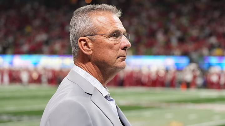 Urban Meyer on the sidelines prior to the 2025 Peach Bowl and semifinal game of the College Football Playoff between the Oregon Ducks and the Indiana Hoosiers at Mercedes-Benz Stadium. Urban Meyer on the sidelines prior to the 2025 Peach Bowl and semifinal game of the College Football Playoff between the Oregon Ducks and the Indiana Hoosiers at Mercedes-Benz Stadium.