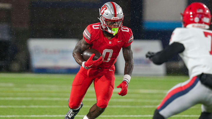 Baylor's David Gabriel Georges (0) carries the ball during the Division II-AAA championship game at Finley Stadium in Chattanooga, Tenn., on Dec. 4, 2025. Baylor's David Gabriel Georges (0) carries the ball during the Division II-AAA championship game at Finley Stadium in Chattanooga, Tenn., on Dec. 4, 2025.