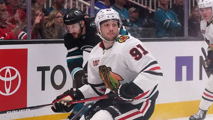Apr 6, 2026; San Jose, California, USA; Chicago Blackhawks center Frank Nazar (91) and San Jose Sharks defenseman Vincent Desharnais (5) chase the puck in the first period at SAP Center at San Jose. Mandatory Credit: David Gonzales-Imagn Images Apr 6, 2026; San Jose, California, USA; Chicago Blackhawks center Frank Nazar (91) and San Jose Sharks defenseman Vincent Desharnais (5) chase the puck in the first period at SAP Center at San Jose. Mandatory Credit: David Gonzales-Imagn Images