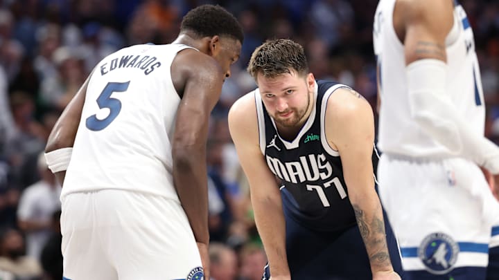 Minnesota Timberwolves guard Anthony Edwards speaks to Dallas Mavericks guard Luka Doncic (77) during the fourth quarter of Game 4 of the Western Conference finals at American Airlines Center in Dallas on May 28, 2024. Minnesota Timberwolves guard Anthony Edwards speaks to Dallas Mavericks guard Luka Doncic (77) during the fourth quarter of Game 4 of the Western Conference finals at American Airlines Center in Dallas on May 28, 2024.