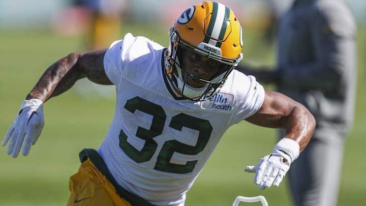 Green Bay Packers running back MarShawn Lloyd (32) runs through drills during rookie minicamp on Friday, May 3, 2024, at the Don Hutson Center in Green Bay, Wis. 
Tork Mason/USA TODAY NETWORK-Wisconsin