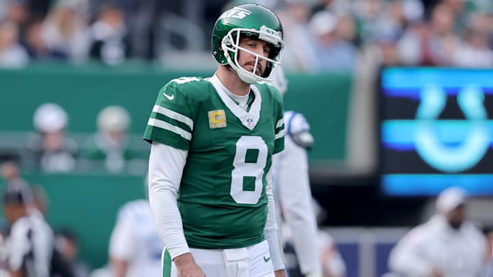 Nov 17, 2024; East Rutherford, New Jersey, USA; New York Jets quarterback Aaron Rodgers (8) reacts during the first quarter against the Indianapolis Colts at MetLife Stadium.