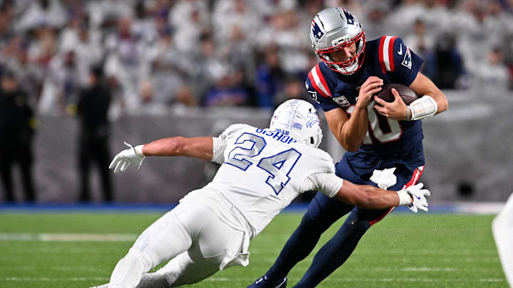 New England Patriots’ quarterback Drake Maye (10) and Buffalo Bills safety Cole Bishop (24).
