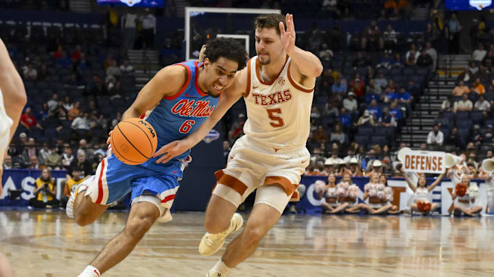 Mar 11, 2026; Nashville, TN, USA;  Mississippi Rebels guard Ilias Kamardine (6) drives to the basket past Texas Longhorns forward Camden Heide (5) during the second half at Arena. Mandatory Credit: Steve Roberts-Imagn Images