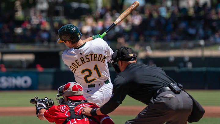 Aug 17, 2025; West Sacramento, California, USA; Athletics left fielder Tyler Soderstrom (21) hits a RBI single against the Los Angeles Angels during the first inning at Sutter Health Park. Mandatory Credit: Neville E. Guard-Imagn Images Aug 17, 2025; West Sacramento, California, USA; Athletics left fielder Tyler Soderstrom (21) hits a RBI single against the Los Angeles Angels during the first inning at Sutter Health Park. Mandatory Credit: Neville E. Guard-Imagn Images