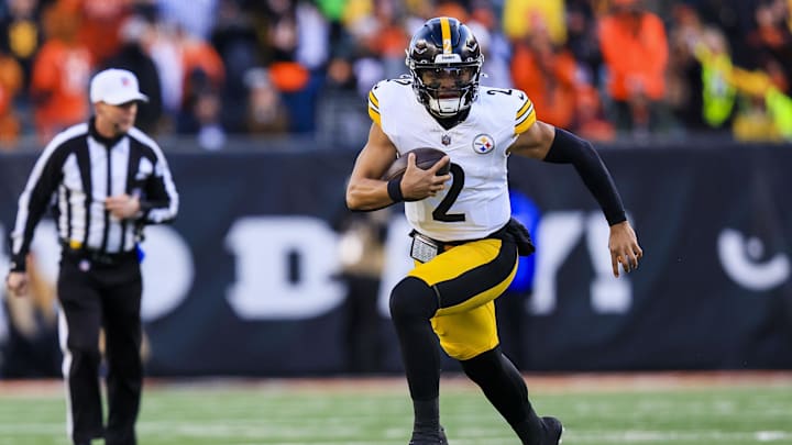 Dec 1, 2024; Cincinnati, Ohio, USA; Pittsburgh Steelers quarterback Justin Fields (2) runs with the ball against the Cincinnati Bengals in the second half at Paycor Stadium. Mandatory Credit: Katie Stratman-Imagn Images Dec 1, 2024; Cincinnati, Ohio, USA; Pittsburgh Steelers quarterback Justin Fields (2) runs with the ball against the Cincinnati Bengals in the second half at Paycor Stadium. Mandatory Credit: Katie Stratman-Imagn Images