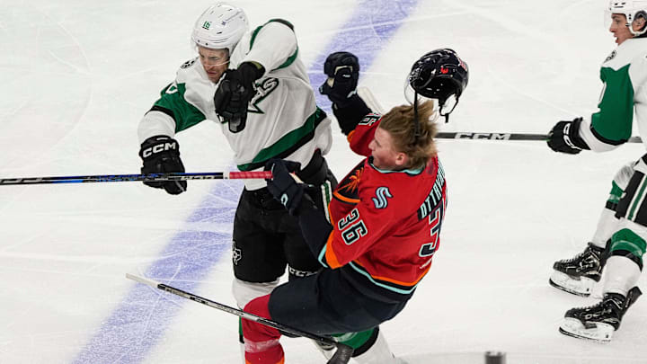 Texas Star Curtis McKenzie, 16, hits and knocks the helmet off of Coachella Valley Firebird Ville Ottavainen, 36, during the first period at Acrisure Arena in Palm Desert, Calif., Nov. 30, 2024. Texas Star Curtis McKenzie, 16, hits and knocks the helmet off of Coachella Valley Firebird Ville Ottavainen, 36, during the first period at Acrisure Arena in Palm Desert, Calif., Nov. 30, 2024.