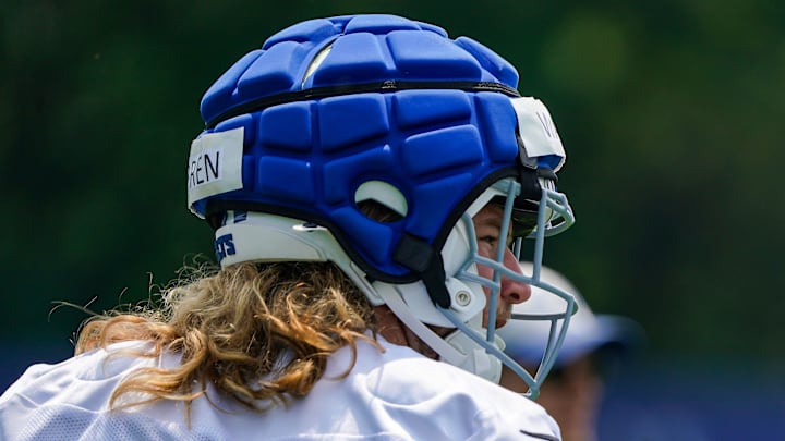 Indianapolis Colts tight end Tyler Warren (84) walks off the field Tuesday, June 10, 2025, during NFL Colts mandatory mini camp at the Indiana Farm Bureau Football Center in Indianapolis.