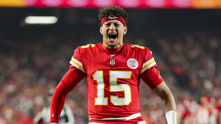 Kansas City Chiefs quarterback Patrick Mahomes (15) gets ready prior to a game against the Los Angeles Chargers at GEHA Field at Arrowhead Stadium. 