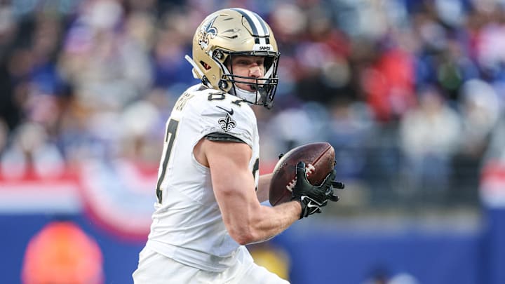 Dec 8, 2024; East Rutherford, New Jersey, USA; New Orleans Saints tight end Foster Moreau (87) makes a catch during the second half against the New York Giants at MetLife Stadium.