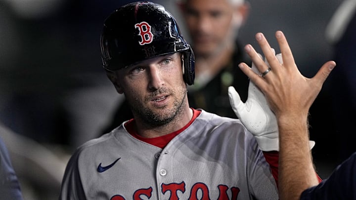 Apr 29, 2025; Toronto, Ontario, CAN; Boston Red Sox third baseman Alex Bregman (2) is congratulated after scoring against the Toronto Blue Jays during the ninth inning at Rogers Centre