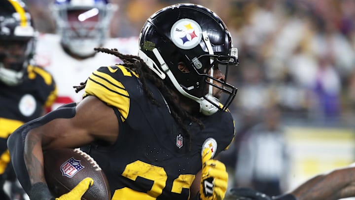 Oct 28, 2024; Pittsburgh, Pennsylvania, USA; Pittsburgh Steelers running back Najee Harris (22) runs the ball against the New York Giants during the second quarter at Acrisure Stadium. Mandatory Credit: Charles LeClaire-Imagn Images