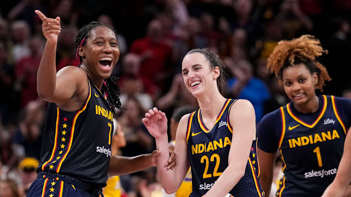 Indiana Fever forward Aliyah Boston (7) celebrates with Indiana Fever guard Caitlin Clark (22) altering recording a triple-double Wednesday, Sept. 4, 2024, during the game at Gainbridge Fieldhouse in Indianapolis. The Indiana Fever defeated the Los Angeles Sparks, 93-86.