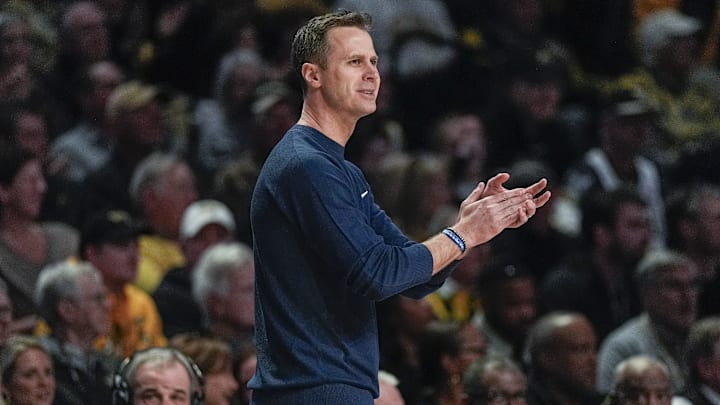 Jan 25, 2025; Winston-Salem, North Carolina, USA; Duke Blue Devils head coach Jon Scheyer cheers his players during the first half against the Wake Forest Demon Deacons at Lawrence Joel Veterans Memorial Coliseum. Mandatory Credit: Jim Dedmon-Imagn Images