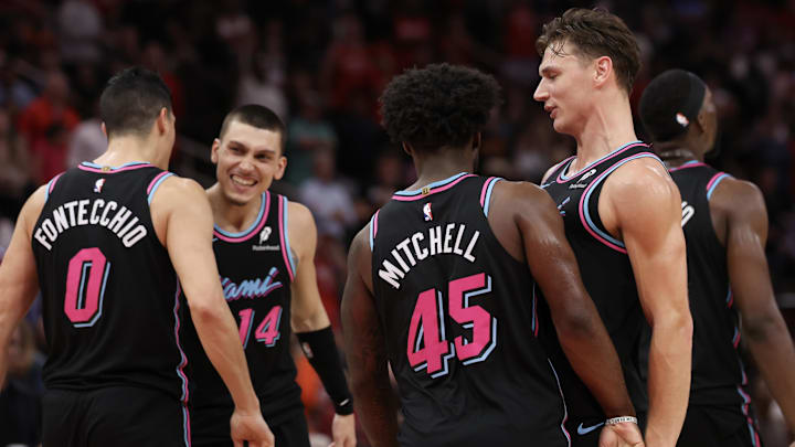 Mar 21, 2026; Houston, Texas, USA;  Miami Heat guard Pelle Larsson (9) and teammates celebrate play against the Houston Rockets in the second half at Toyota Center. Mandatory Credit: Thomas Shea-Imagn Images