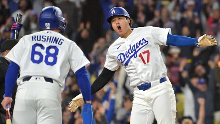 Apr 27, 2026; Los Angeles, California, USA; Los Angeles Dodgers catcher Dalton Rushing (68) and two-way player Shohei Ohtani (17) score on a walk-off single by right fielder Kyle Tucker (23) in the ninth inning to defeat the Miami Marlins at Dodger Stadium. Mandatory Credit: Jayne Kamin-Oncea-Imagn Images