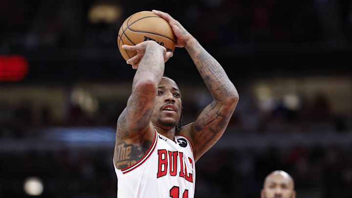 Feb 3, 2024; Chicago, Illinois, USA; Chicago Bulls forward DeMar DeRozan (11) shoots a free throw against the Sacramento Kings during the first half at United Center. Mandatory Credit: Kamil Krzaczynski-Imagn Images
