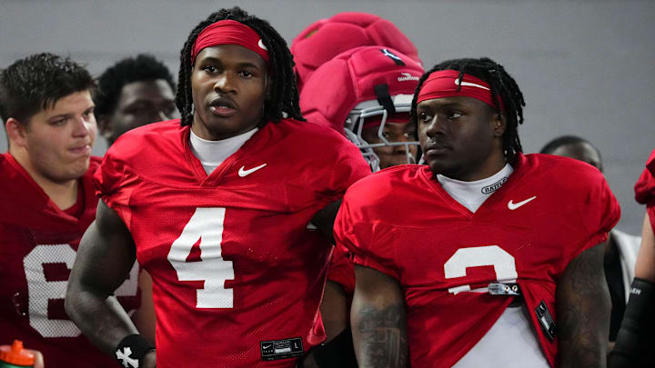 Ohio State Buckeyes wide receiver Jeremiah Smith talks to running back Legend Bey during Student Appreciation Day spring practice Ohio State Buckeyes wide receiver Jeremiah Smith talks to running back Legend Bey during Student Appreciation Day spring practice