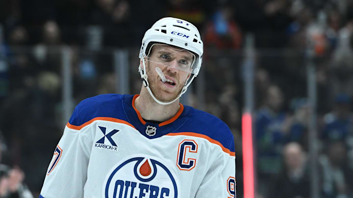 Oct 26, 2025; Vancouver, British Columbia, CAN;Edmonton Oilers center Connor McDavid (97) getting ready for the faceoff during the second period against the Vancouver Canucks at Rogers Arena. Mandatory Credit: Simon Fearn-Imagn Images