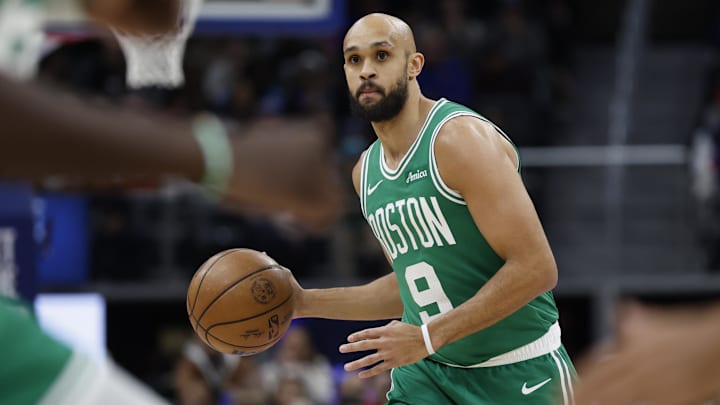 Jan 19, 2026; Detroit, Michigan, USA;  Boston Celtics guard Derrick White (9) dribbles the ball against the Detroit Pistons during the first half at Little Caesars Arena. Mandatory Credit: Rick Osentoski-Imagn Images