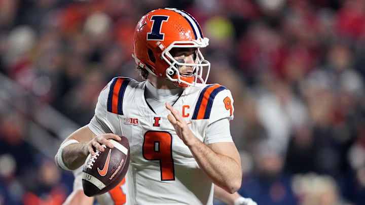 Nov 22, 2025; Madison, Wisconsin, USA; Illinois Fighting Illini quarterback Luke Altmyer (9) throws the ball against the Wisconsin Badgers during the second quarter at Camp Randall Stadium. Mandatory Credit: Kayla Wolf-Imagn Images Nov 22, 2025; Madison, Wisconsin, USA; Illinois Fighting Illini quarterback Luke Altmyer (9) throws the ball against the Wisconsin Badgers during the second quarter at Camp Randall Stadium. Mandatory Credit: Kayla Wolf-Imagn Images
