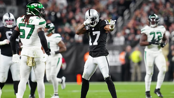 Nov 12, 2023; Paradise, Nevada, USA; Las Vegas Raiders wide receiver Davante Adams (17) gestures after gaining a first down against the New York Jets during the second quarter at Allegiant Stadium. Mandatory Credit: Stephen R. Sylvanie-Imagn Images Nov 12, 2023; Paradise, Nevada, USA; Las Vegas Raiders wide receiver Davante Adams (17) gestures after gaining a first down against the New York Jets during the second quarter at Allegiant Stadium. Mandatory Credit: Stephen R. Sylvanie-Imagn Images