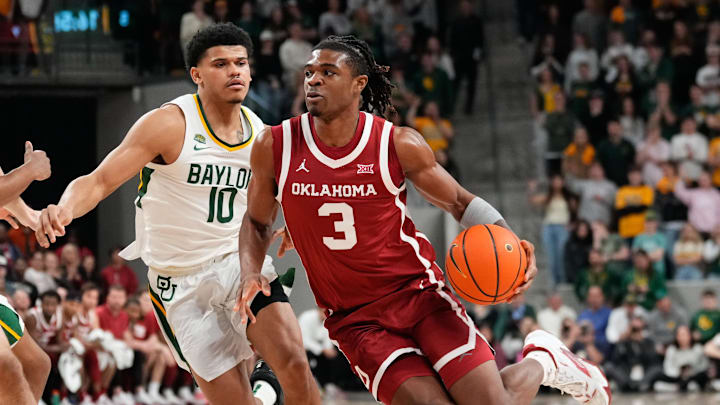 Feb 13, 2024; Waco, Texas, USA;  Oklahoma Sooners guard Otega Oweh (3) drives to the basket past