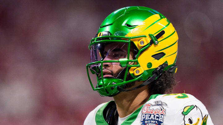 Oregon quarterback Dante Moore warms up as the Oregon Ducks face the Indiana Hoosiers in the Peach Bowl on Jan. 9, 2026, at Mercedes-Benz Stadium in Atlanta, Georgia.