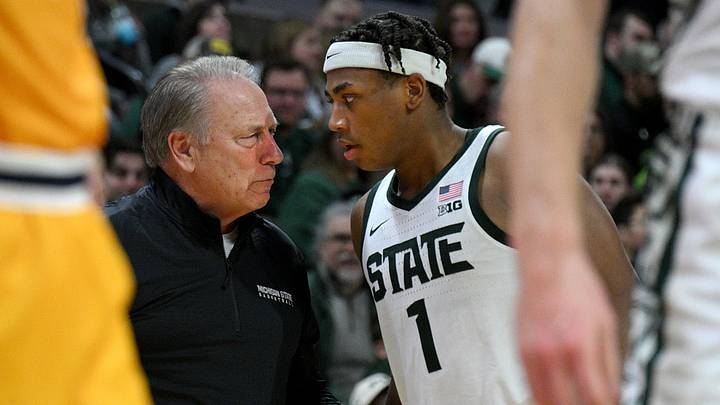Dec 16, 2025; East Lansing, Michigan, USA; Michigan State Spartans head coach Tom Izzo pulls Michigan State Spartans guard Jeremy Fears Jr. (1) aside for a moment and shares some wisdom during the second half at Jack Breslin Student Events Center. Mandatory Credit: Dale Young-Imagn Images Dec 16, 2025; East Lansing, Michigan, USA; Michigan State Spartans head coach Tom Izzo pulls Michigan State Spartans guard Jeremy Fears Jr. (1) aside for a moment and shares some wisdom during the second half at Jack Breslin Student Events Center. Mandatory Credit: Dale Young-Imagn Images